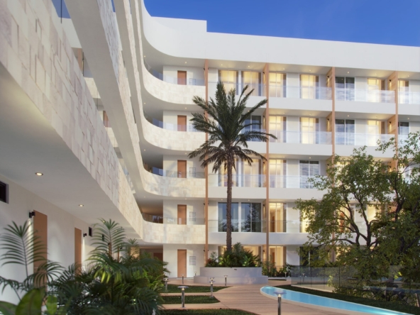 a building with a pool and trees