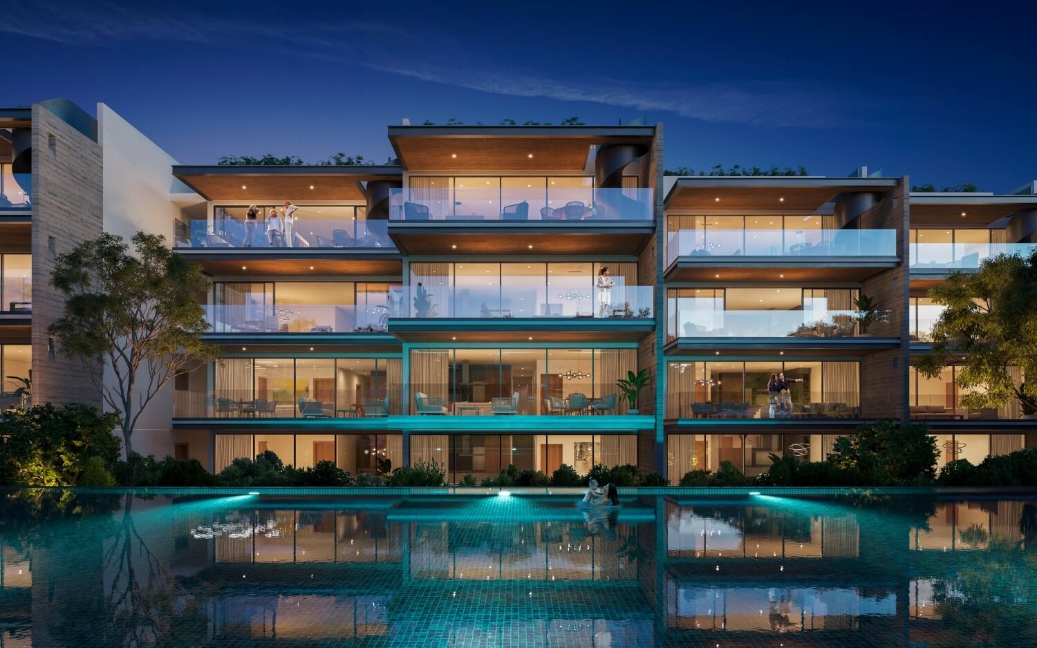 a building with a pool and people in front of it