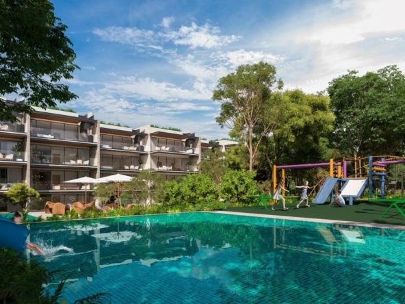 a pool with a slide and a building in the background