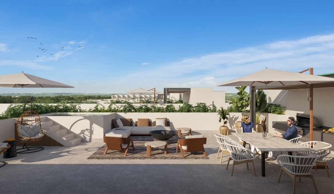 a patio with a table and chairs